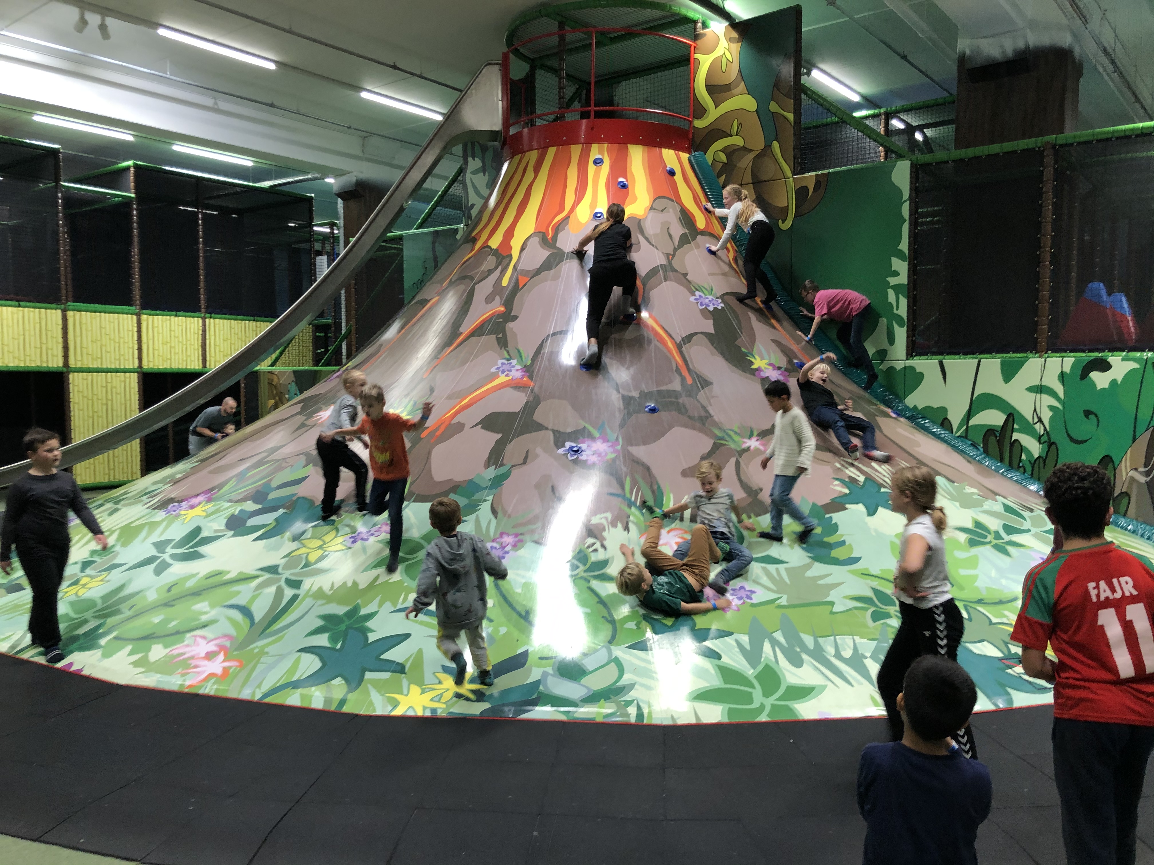 Children playing together on the volcano